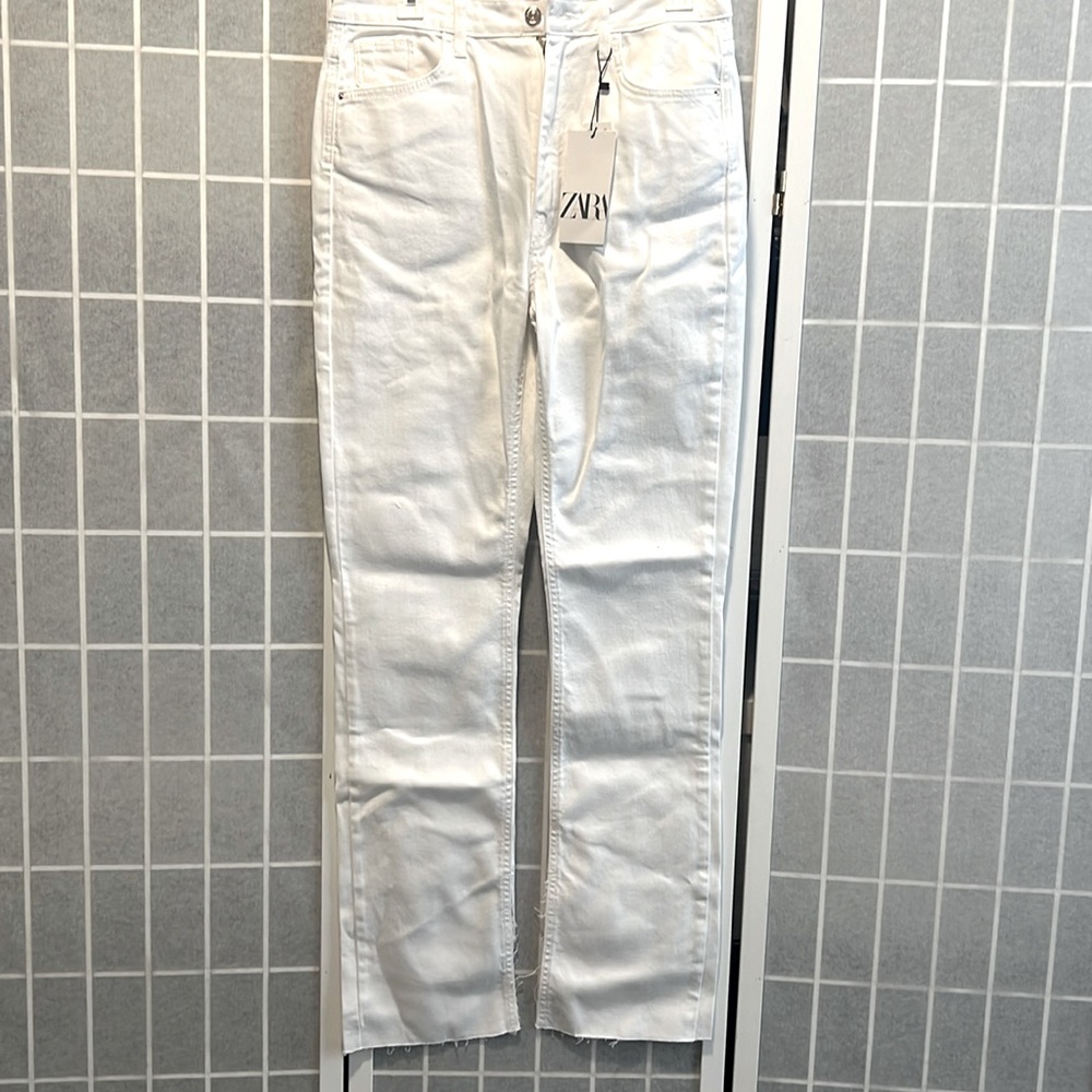 Zara’s High Rise Flare White Jeans
